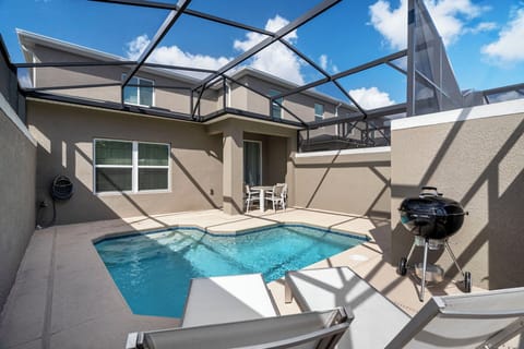 Enjoy a screened pool with sunshine in and bugs out.