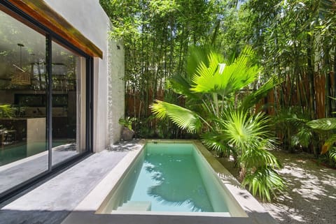 Unwind by the private pool, soaked in sun and serenity