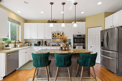 Eat in Kitchen with double wall oven and 5 burner chef gas cook top