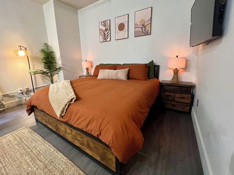 Plush king size bed with 56" TV
