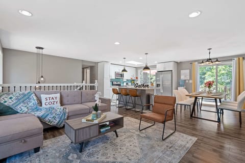 Open living and dining area, designed for seamless entertaining and comfort.