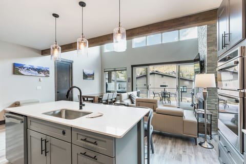 Main Living Space, Dining and Kitchen - Deck access and views - TV and Gas Fireplace