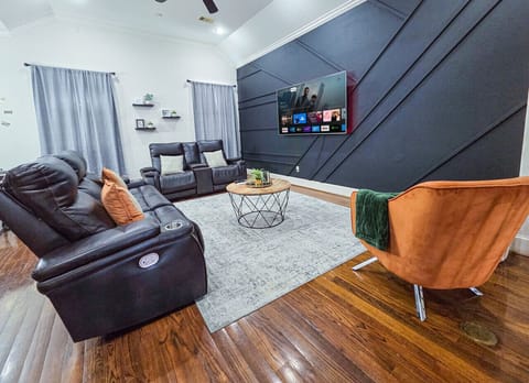 Relax on a leather reclining sofas in this intimate living room and take full advantage of your 75inch Smart TV, complete with several streaming services including Netflix, Hulu, Amazon Prime, and more.