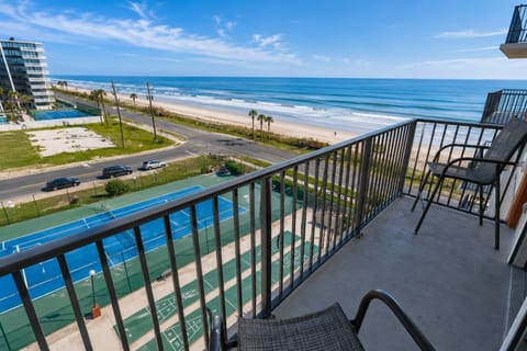 Oceanfront Serenity: Relax on the patio and enjoy unparalleled views of the Atlantic.