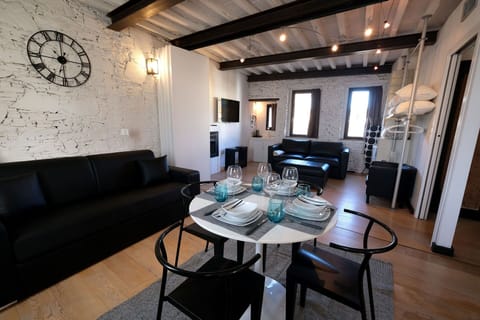 Furniture, Table, Couch, Living Room, Interior Design, Clock, Floor, Flooring, Wood, Studio Couch