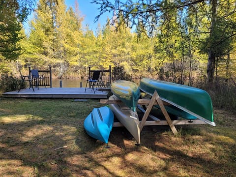 OVERALL: The private deck on Goose Creek and the kayaks and canoes that are available for guests to use.