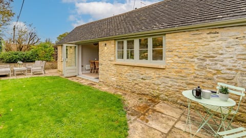 The enclosed lawn is perfect for family games and letting the dogs out