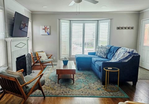 Living room with front outdoor patio.
