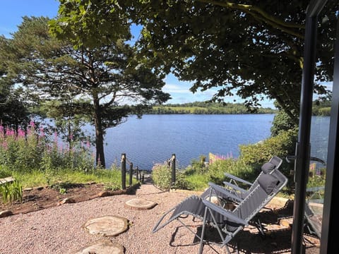 Steps leading to the lakeshore with panoramic water views 
