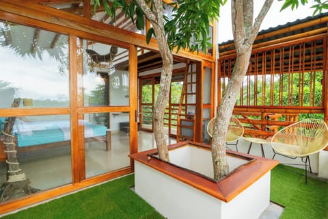 Deluxe Suite, Private Bathroom, Beach View | Desk, laptop workspace, soundproofing, WiFi (free)