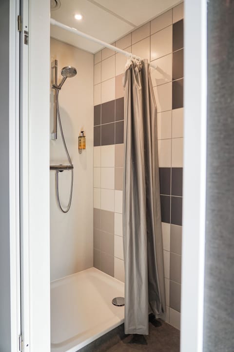 Economy Double Room | Bathroom | Shower, soap, toilet paper