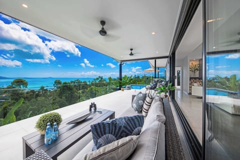 Expansive deck with uninterrupted Island views and pool access