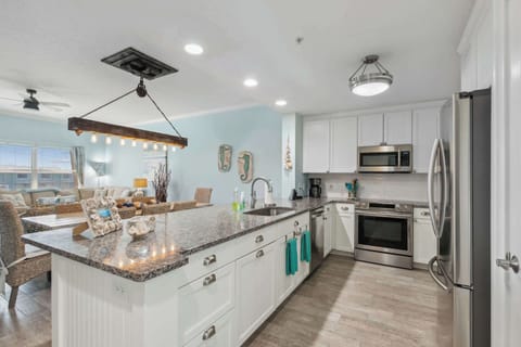 Kitchen, stainless steel appliances. Pantry for food storage