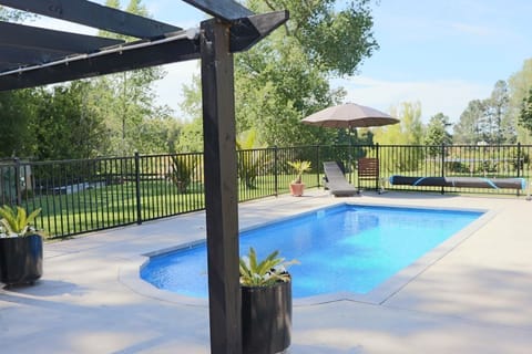Lounge by the pool & splash all day - incl changing room, pool toys and towels.