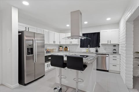 NEW Modern Kitchen-well appointed, spacious counters, separate dining area
