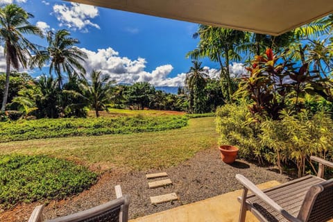Alii Kai 10A is a beautiful ground-floor unit that feels like a luxurious tropical retreat. The private lanai looks out at the lush mountainous interior of the island, and butts right up to a grassy yard space where you can soak up the sun.
