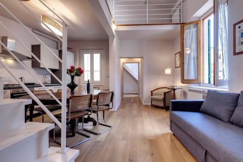 Duplex | Living area | 40-inch flat-screen TV with digital channels