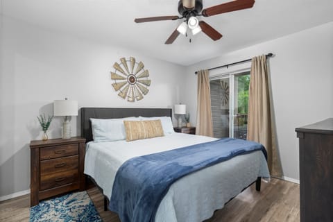 Spacious master bedroom featuring a king-size bed and ensuite bathroom.