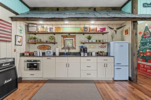 Kitchenette  conventional micro wave refrigerator,Flacracker dishes/cups


