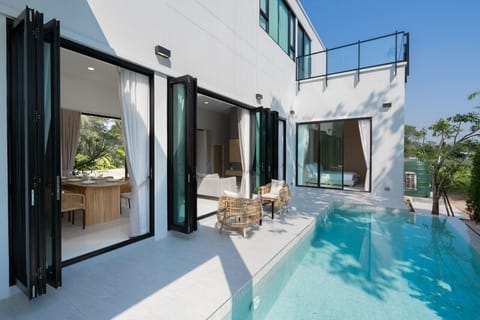 Deluxe Villa, 3 Bedrooms, Pool View | Living area | 32-inch flat-screen TV with cable channels