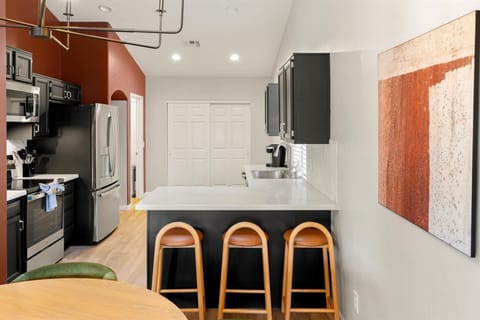 Gather around our large island with high seating—perfect for casual dining and lively conversations!