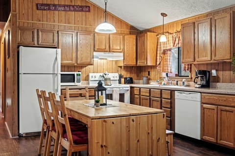 Large island counter with barstool seating.
