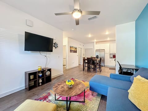 Relax and unwind in this stylish and cozy living room with sofa chaise lounge.