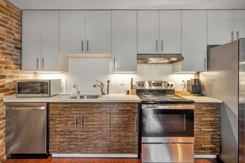 Kitchen: A fully equipped kitchen with sleek, modern appliances for all your cooking needs.