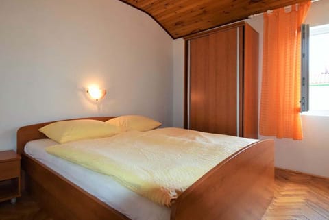 Cozy bedroom with warm lighting.