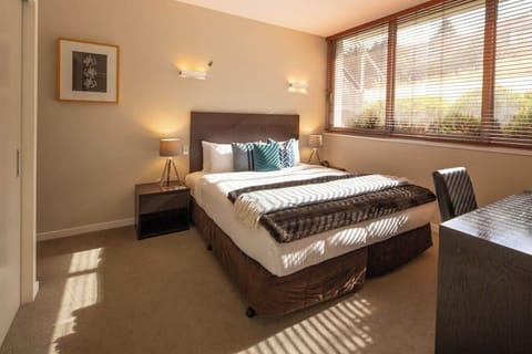 Bedroom with a garden outlook