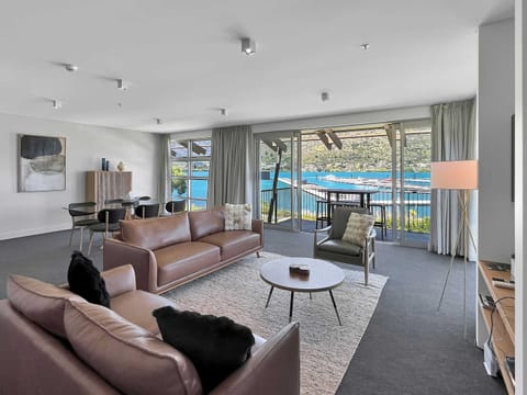 Relaxed open-plan living with natural light throughout.