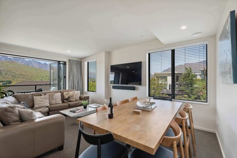 A bright and welcoming space to relax, dine, and take in the mountain views after a day exploring Queenstown.