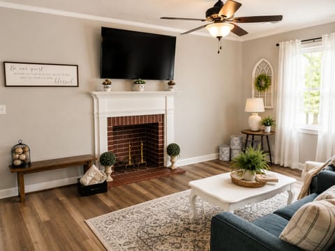 Relax after a day of exploring with a movie by the fireplace.