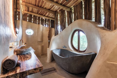 Suite, 1 Queen Bed, Bathtub | Bathroom | Combined shower/tub, free toiletries, hair dryer, bathrobes