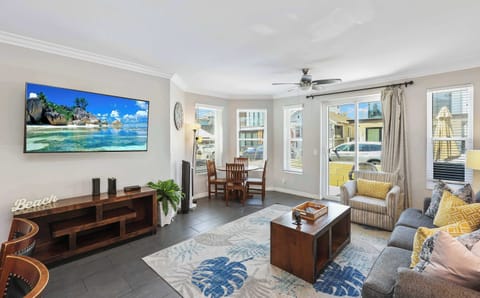 Unwind in the serene living room & enjoy a relaxed movie night at home