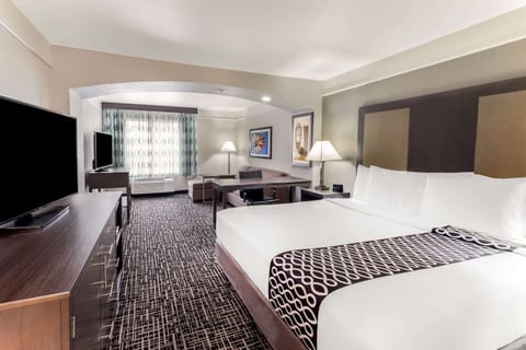 Deluxe Suite, 1 King Bed, Non Smoking | Premium bedding, desk, blackout drapes, iron/ironing board