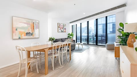 Open-plan dining and living area with outside views