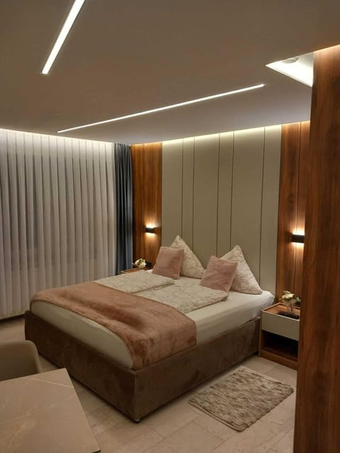 Down comforters, Select Comfort beds, laptop workspace, soundproofing