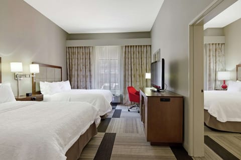 King Bed and Two Queen Bed Room, Refrigerator and Microwave | Blackout drapes, iron/ironing board, free cribs/infant beds, free WiFi