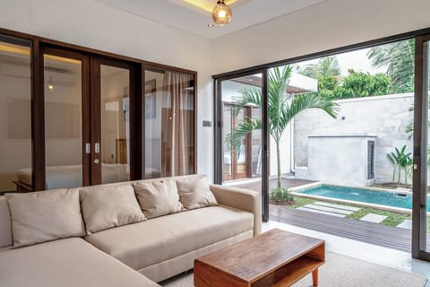 Deluxe Villa, 2 Bedrooms | Living area | 45-inch flat-screen TV with cable channels