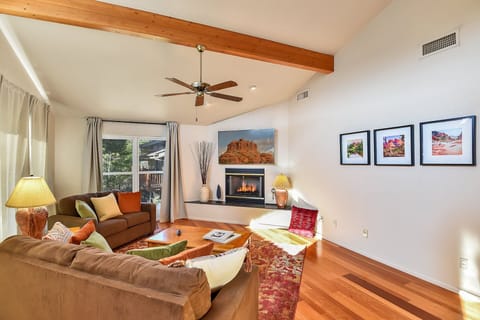 The space is bathed in natural light, creating a warm and inviting atmosphere that highlights the beauty of the surrounding landscape.