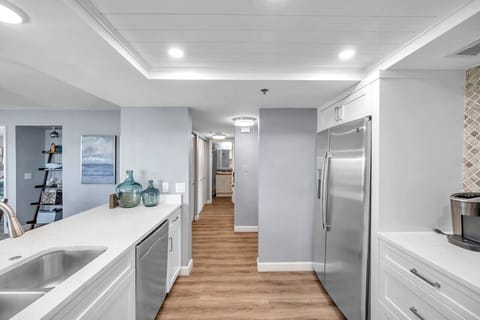 Bright entry hallway leading toward the main living spaces w/ a clean, open feel.