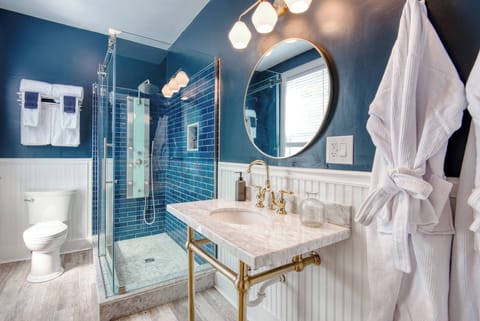 Suite #4 | Bathroom | Hair dryer, bathrobes, towels, soap