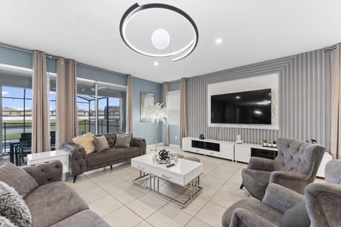 Step into luxury! ✨ This stunning open-concept living room combines elegance and comfort for the ultimate stylish retreat