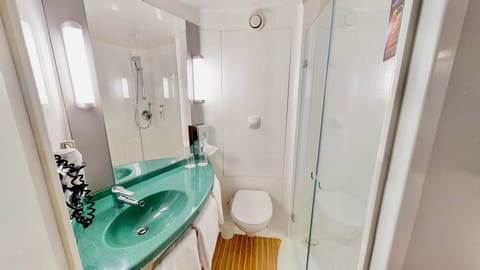 Shower, eco-friendly toiletries, hair dryer, towels