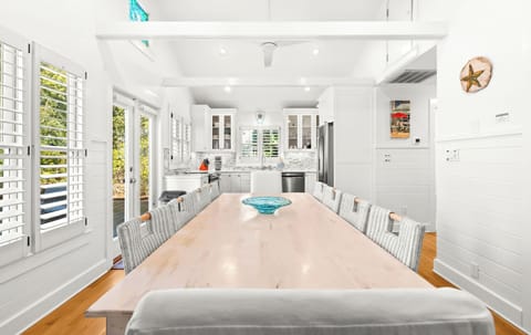 The dining area flows into the kitchen for easy service