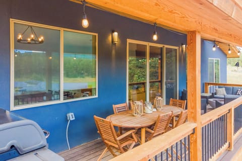 Enjoy your meals outdoors, or do some grilling on our propane grill. This deck is also complete with lounge chairs and a propane fire pit