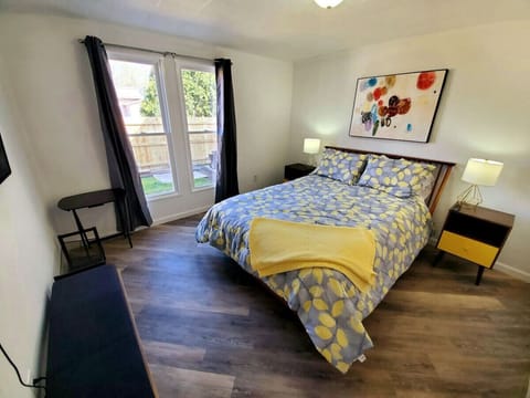 Queen bed with 50 in TV