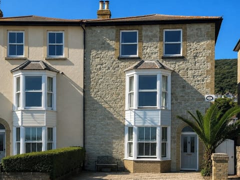 The house on the right with two parking spaces on the drive