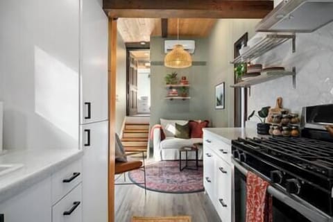 Kitchen flows nicely to living room.